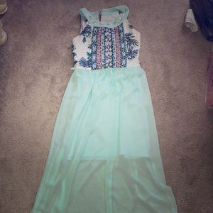 A flowy blue patterned dress.